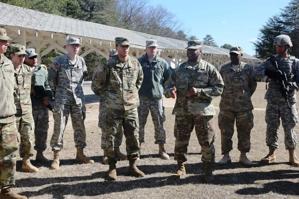 a-group-of-military-men-standing-next-to-each-other